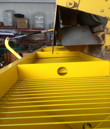 image of chip spreader hopper grizzly screens