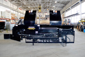 image of rebuilt etnyre used chip spreader side delivery system