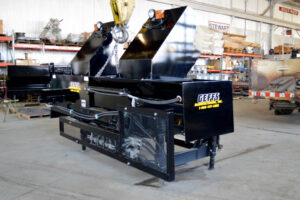 image of rebuilt etnyre used chip spreader side delivery system